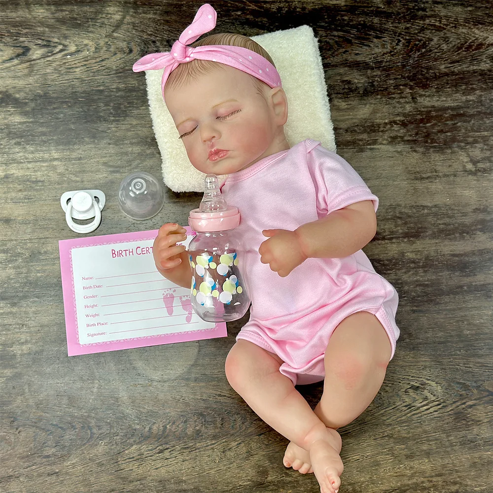 Muñeca Reborn de vinilo de 22 pulgadas |   Pelo pintado a mano, cara de porciones |   Textura realista |   Lavable y Sittable |   Conjunto de traje rosa |