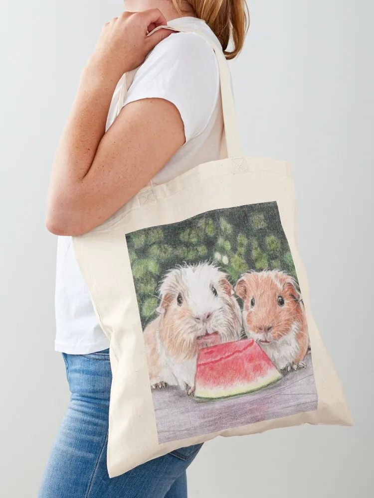 

Two cute guinea pigs eating watermelon Tote Bag Eco bag university shopper bag Canvas Shopping bags