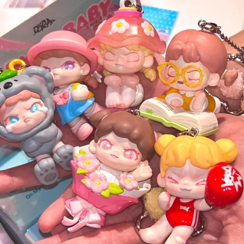 

Оригинальная серия Baby Dora Little Time: Загадочная коробка-сюрприз с милыми миниатюрными брелоками-фигурками, игрушками, украшениями для рабочего стола, подвесками, подарками