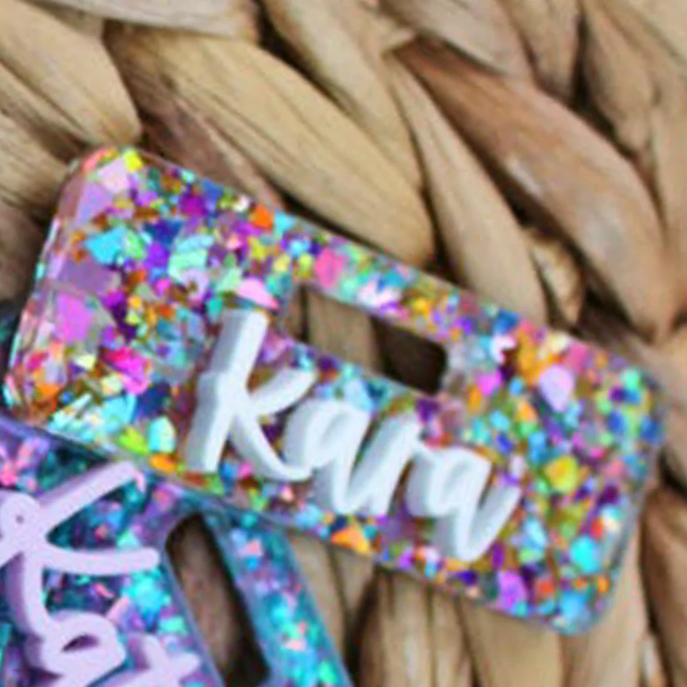 Custom acrylic name badges, with elegant fonts and glittery sequins embellishing the personalized collars, suitable for nurses,