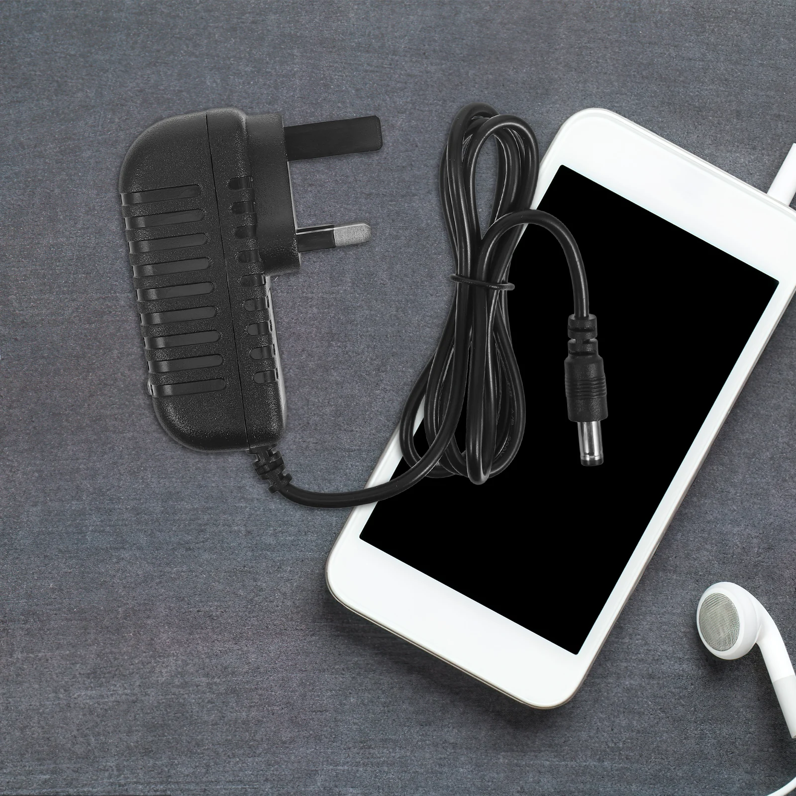 

UK Plug Adapter 100-240V Input 9V 1A Output 5.5x2.5mm Port Travel Universal Power Converter Voltage Transformer