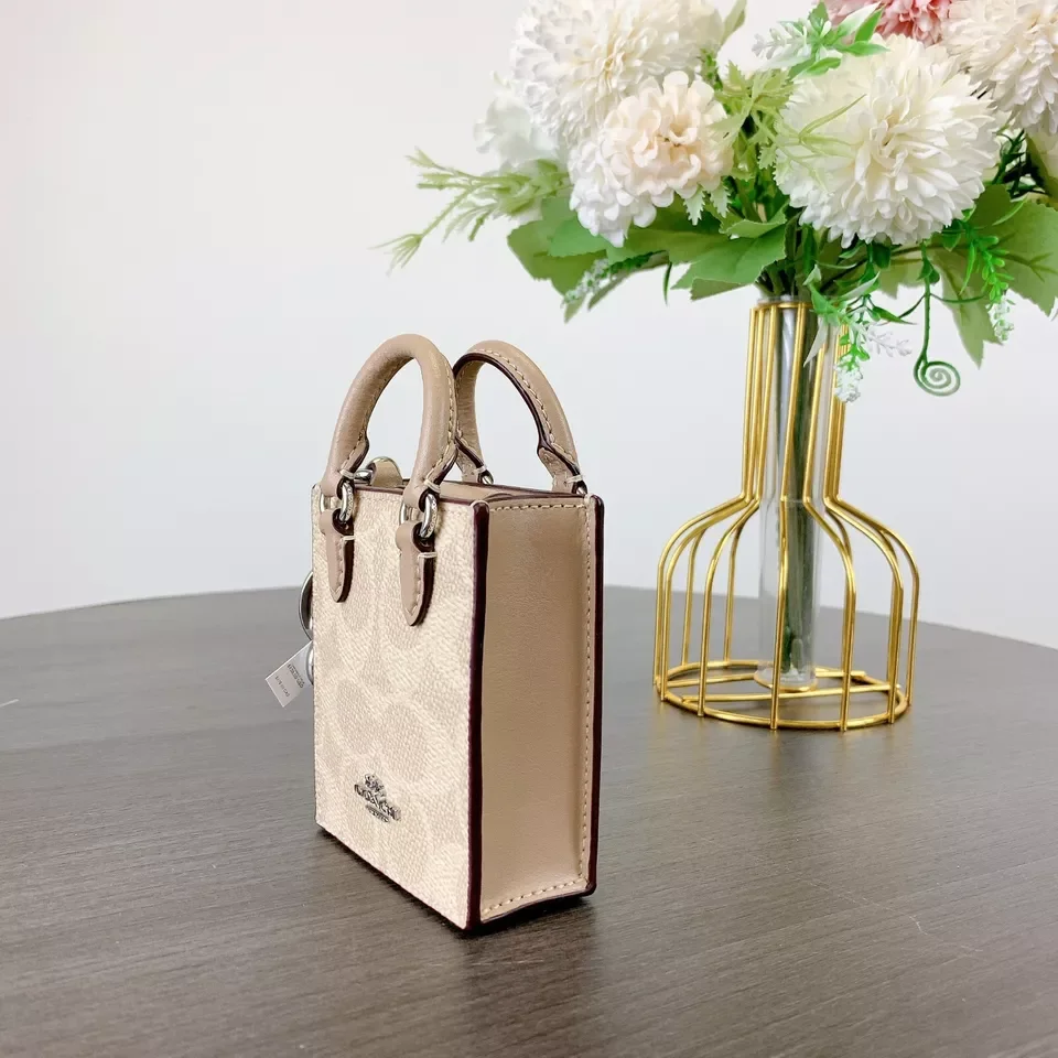 الشمال/جنوب حقيبة صغيرة سلسلة مفاتيح سحرية للنساء سحر لحقائب اليد حقيبة أنيقة قلادة صغيرة ل أكياس المدرب محفظة اكسسوارات