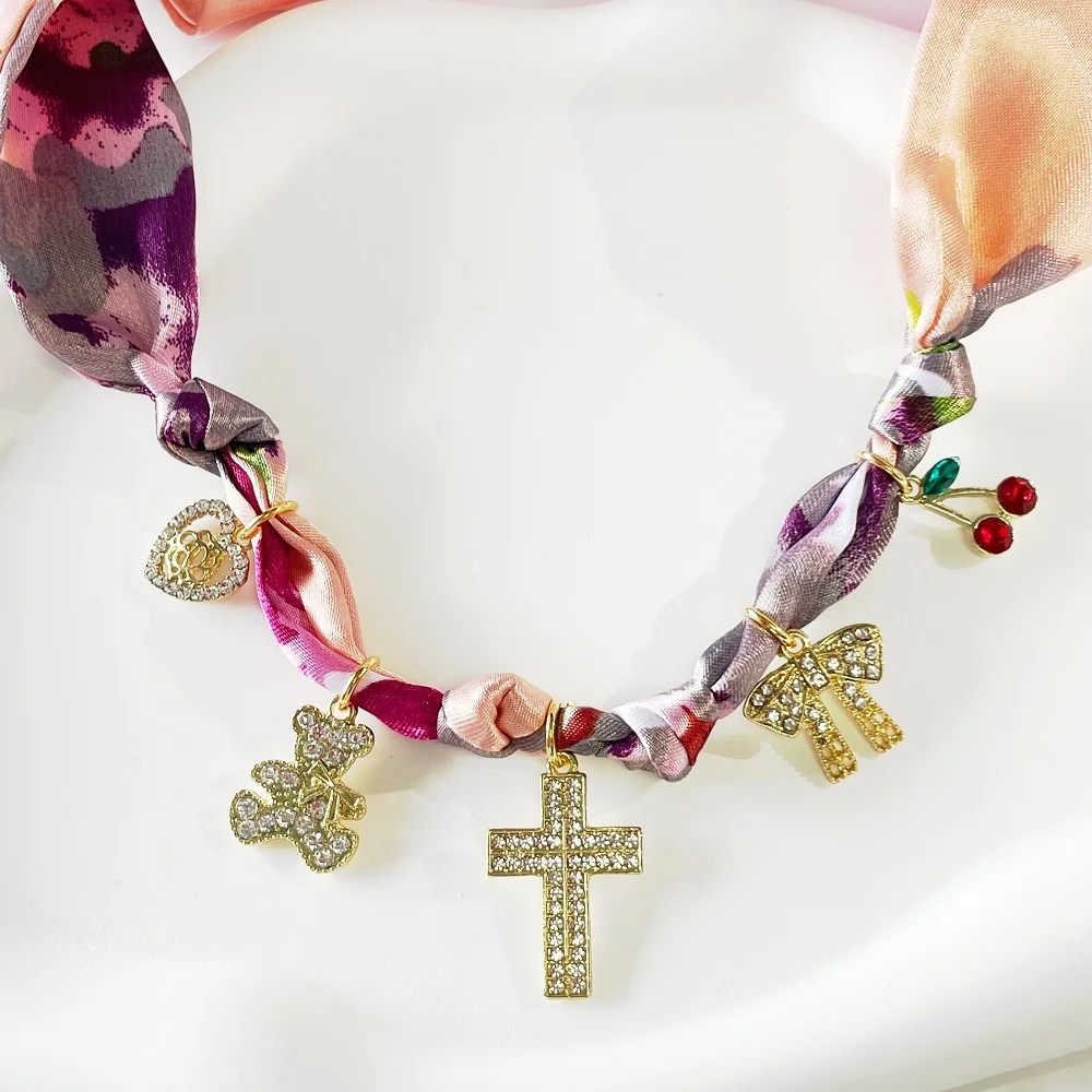 

Women's Bandana Scarf Necklace with Zircon Charms – Teddy Bear, Cross, Heart & Bow