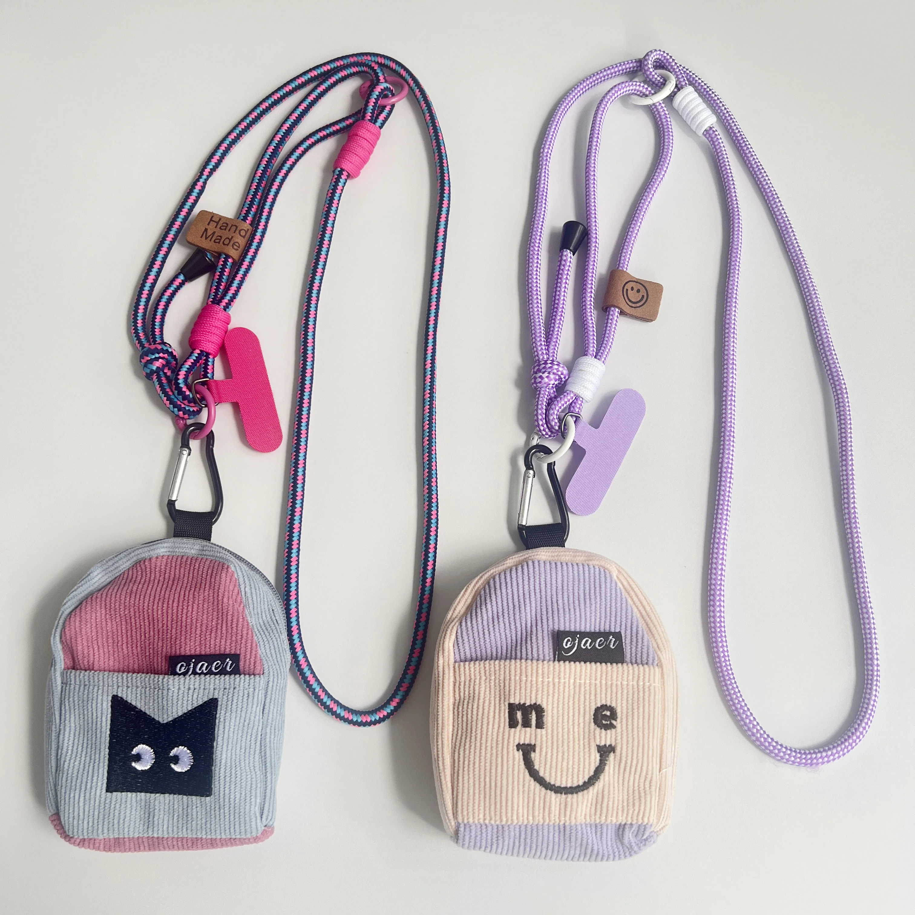 

Простой и регулируемый ремешок для мобильного телефона 2-в-1, короткий ремешок на запястье, наушники, маленькая сменная мини-сумка для аксессуаров, кулон