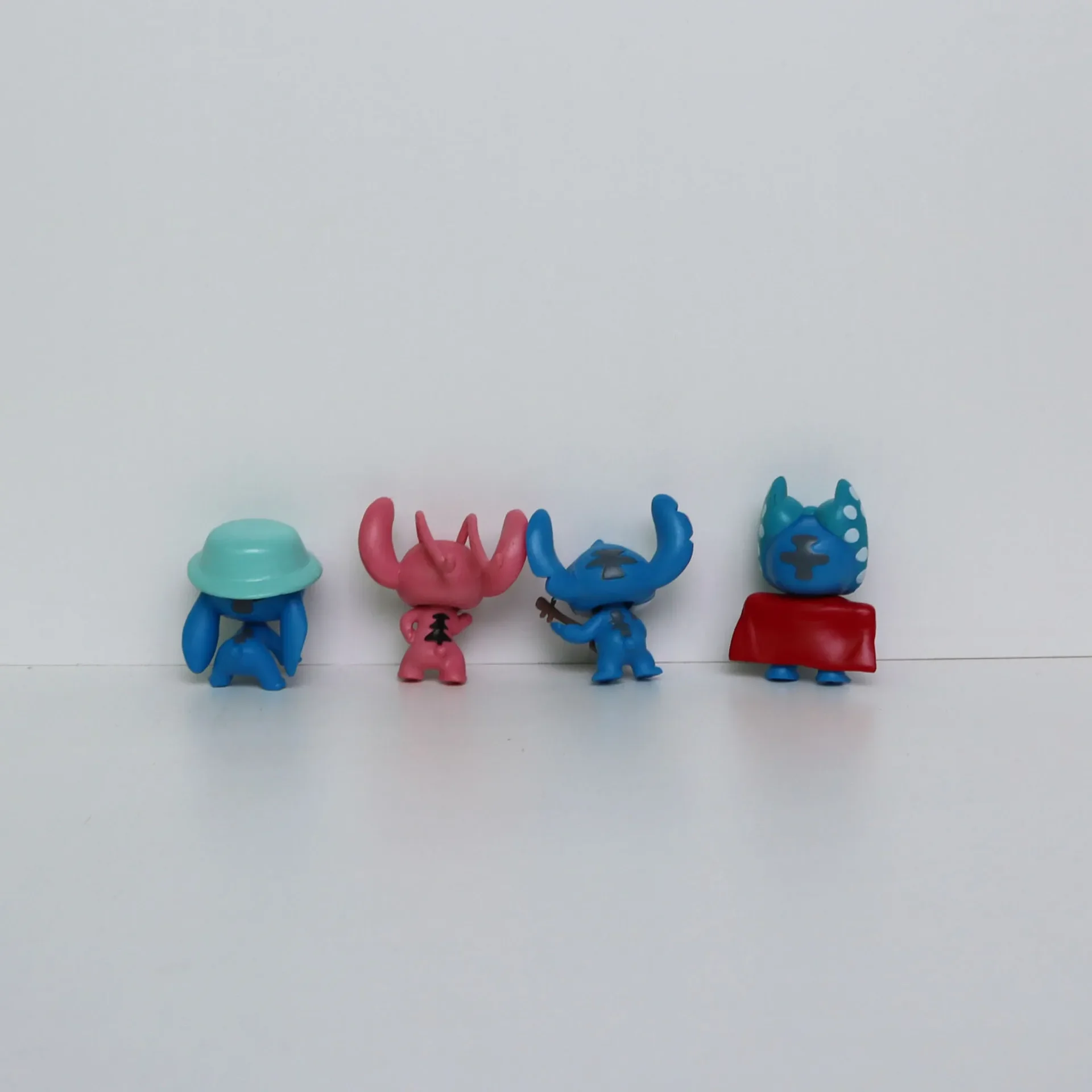 @ 10 Uds. De dibujos animados de Anime Lilo & Stitch Angel, modelo de figura de acción, colección de adornos de escritorio, decoración de pastel de cumpleaños, juguetes para niños