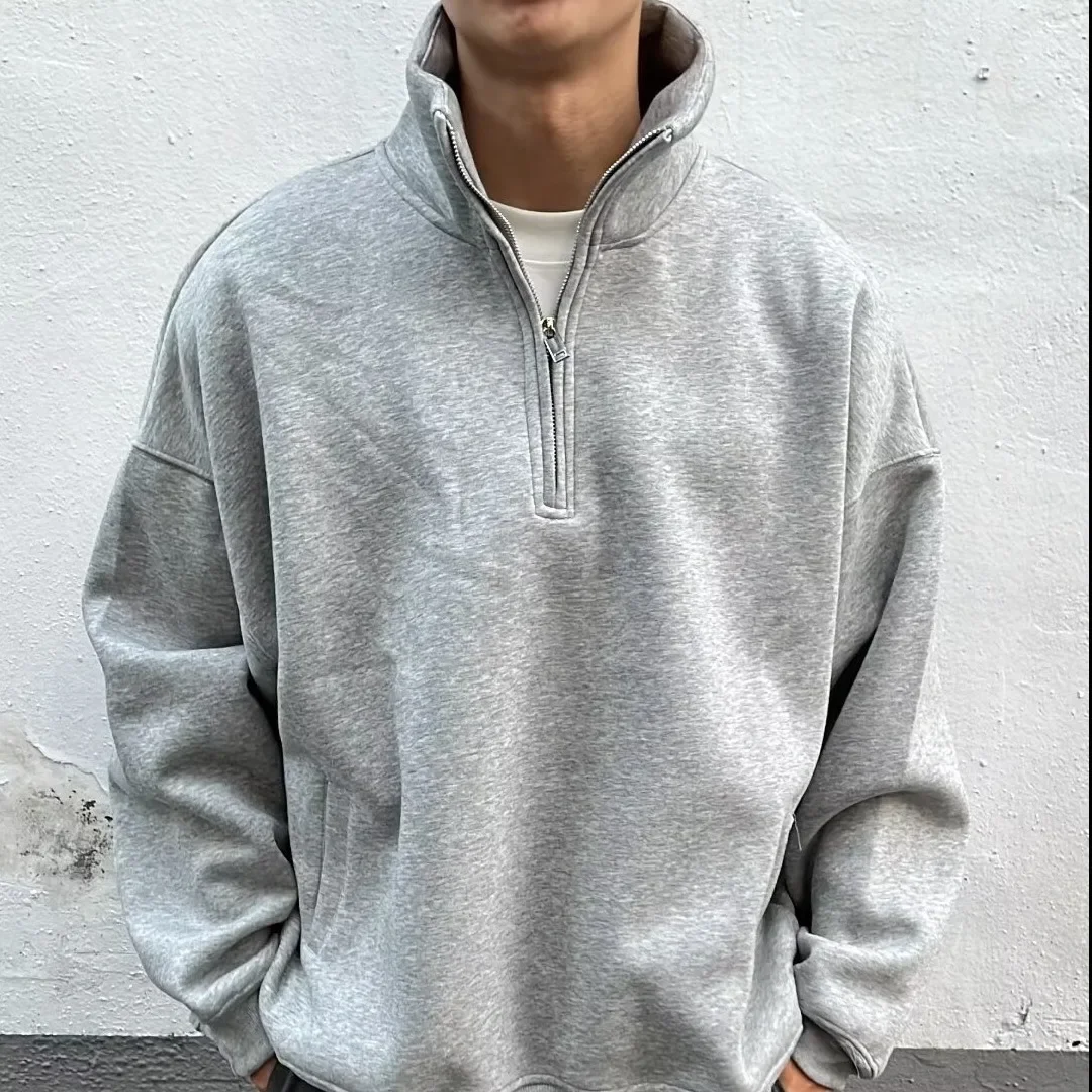 Felpa con mezza zip stile americano da uomo all'inizio della primavera Casual tinta unita giacca con colletto alla coreana vestibilità ampia abbigliamento Oversize da uomo