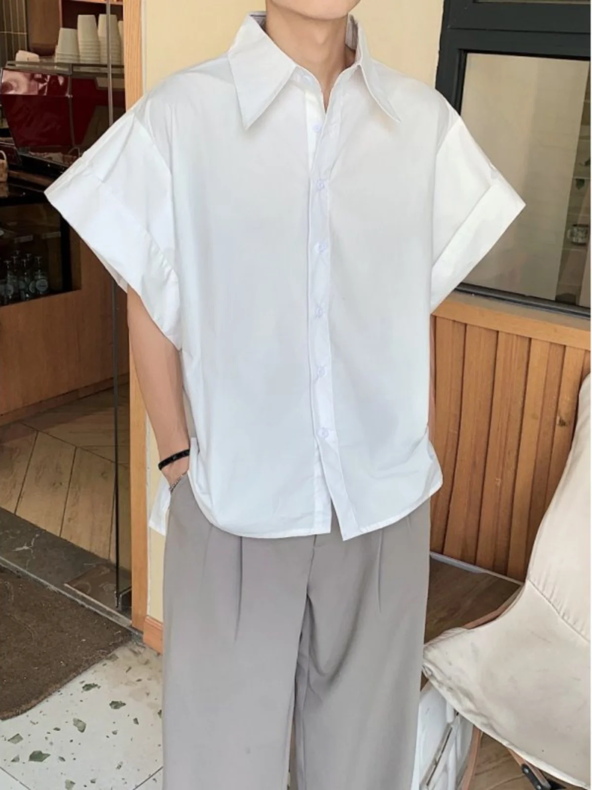 

Мужская летняя футболка в американском ретро-стиле, свободного кроя, с отложным воротником, модная, с широким вырезом, дышащая, из чистого хлопка...