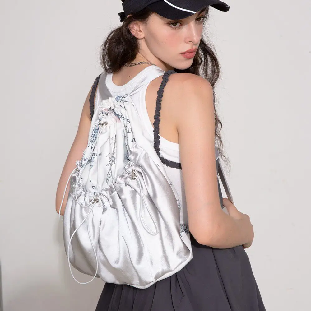 

2026 Original Fashion Printed Silver Reflective Glossy Canvas Women Bag Drawstring Style Backpack With Drawstring Closure Trendy