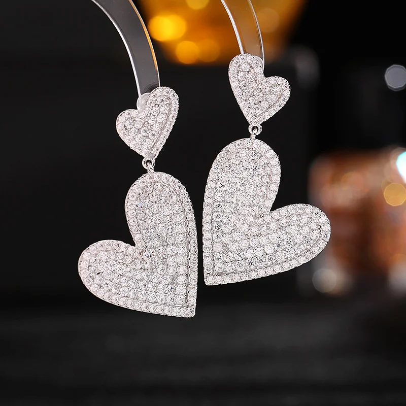 

Серьги из серебра 925 пробы, легкие, роскошные, высококачественные, с небольшим количеством цирконов, двухслойные, в форме сердца, с эффектом «сердце к сердцу».