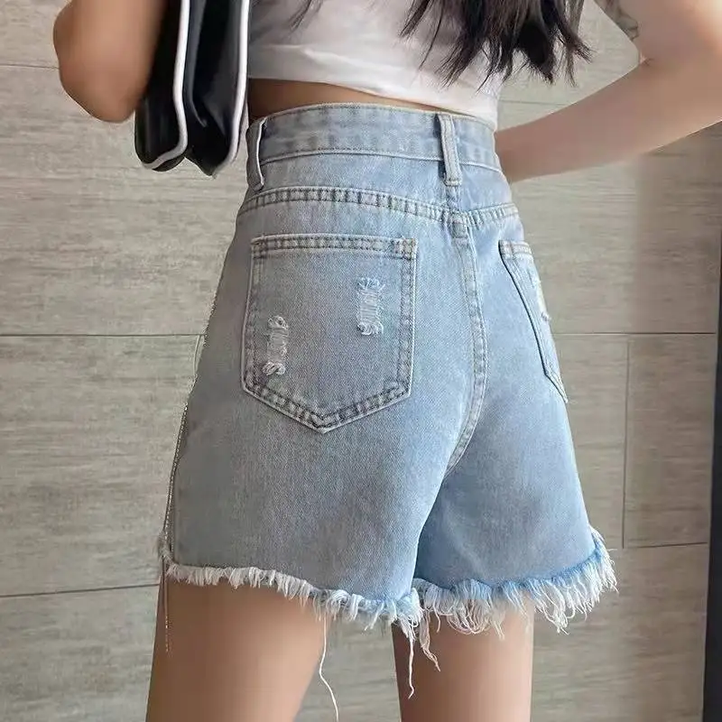 Design Sense Tassel Raw Edge Denim Shorts Women's Summer Female New Shiny High-waisted Slimming A-line Wide Leg Hot Pants Q834