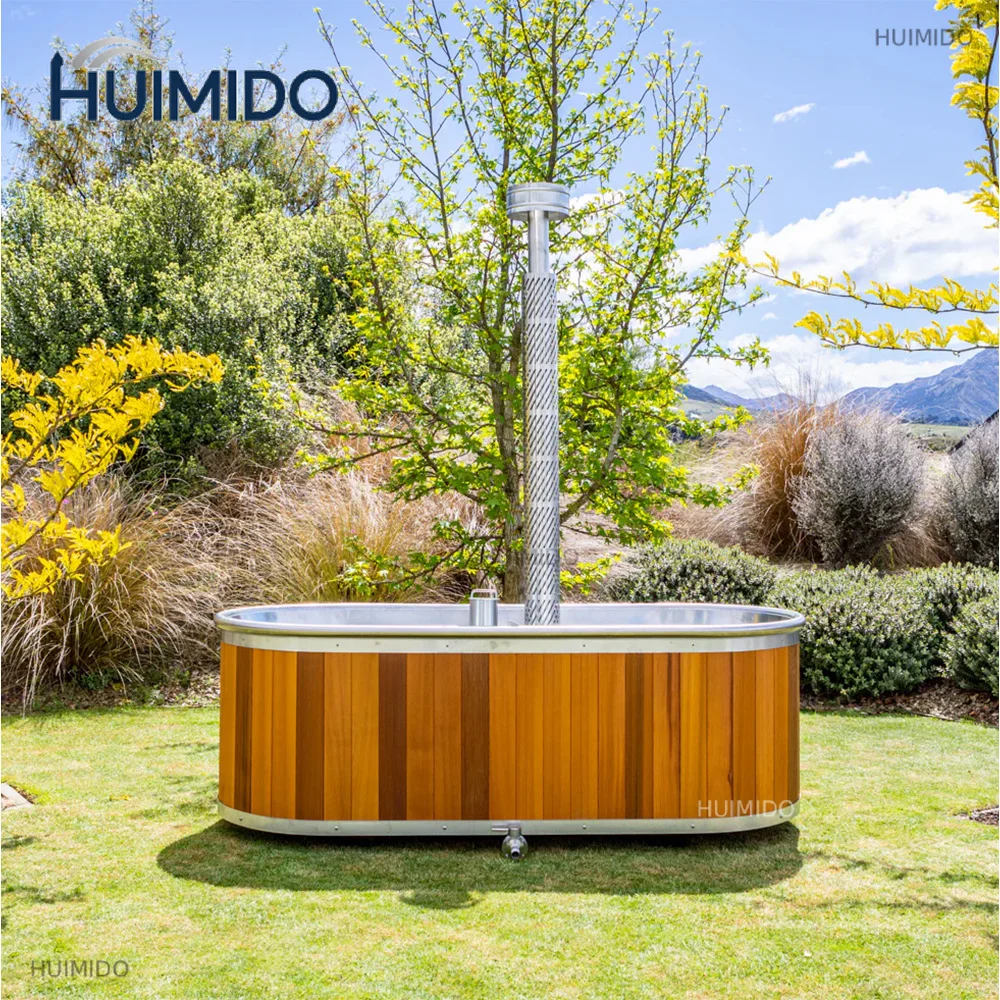 Modern Red Cedar wood combustion outdoor hot tub spa with a capacity of 2-4 people, equipped with a stainless steel inner tank