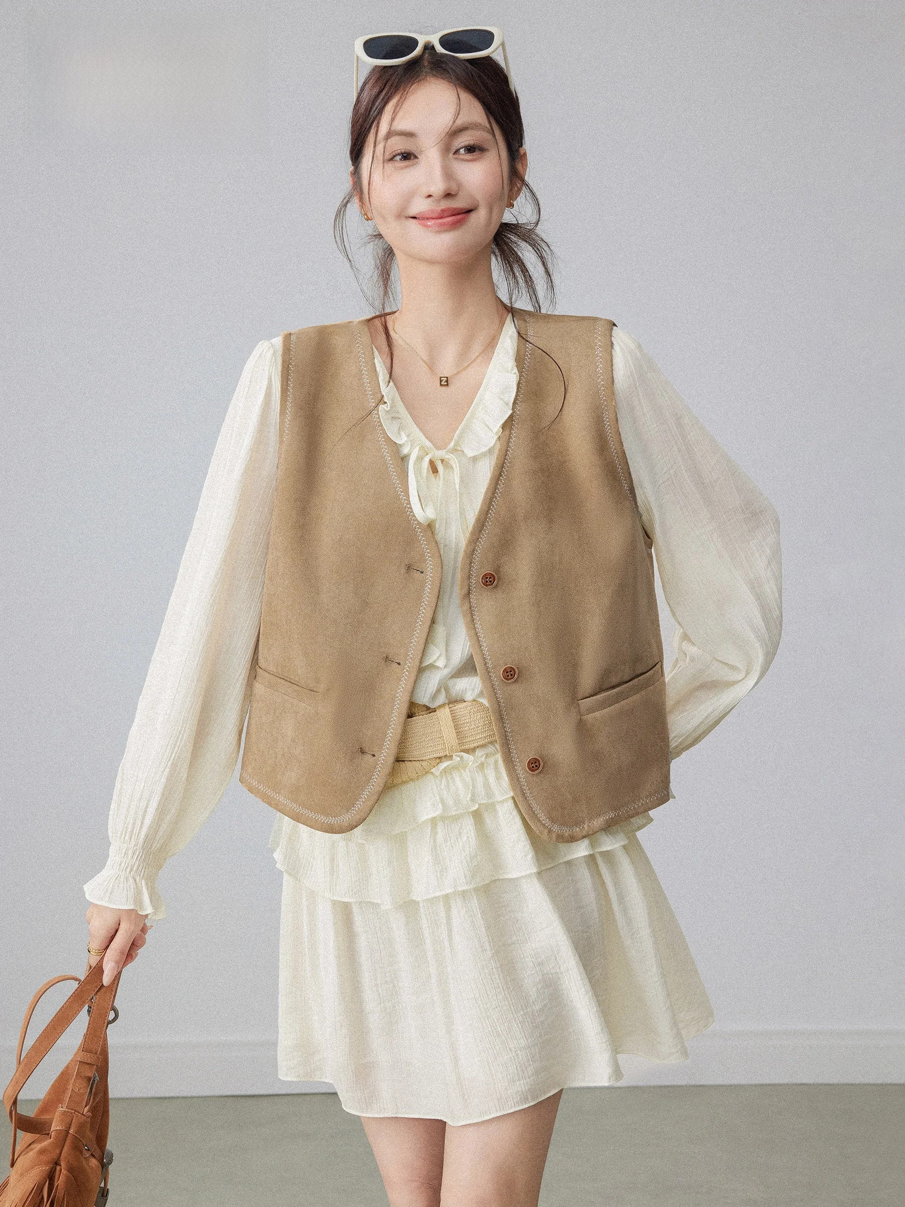 

Женский замшевый жилет-топ для лета и весны, в отпускном стиле, без рукавов, с подплечниками, свободного кроя, с V-образным вырезом, на одной пуговице