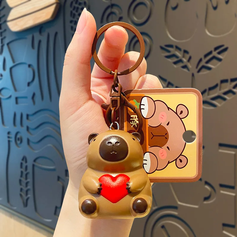 520การ์ตูนน่ารัก capybara Hug Love with Light Sound keychain ของเล่นเปล่งที่ห้อยไฟ