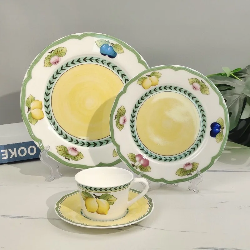 

Fine Dinnerware Set Includes Steak Plates Coffee Cups and Fruit Bowls for Wedding and Housewarming Gifts