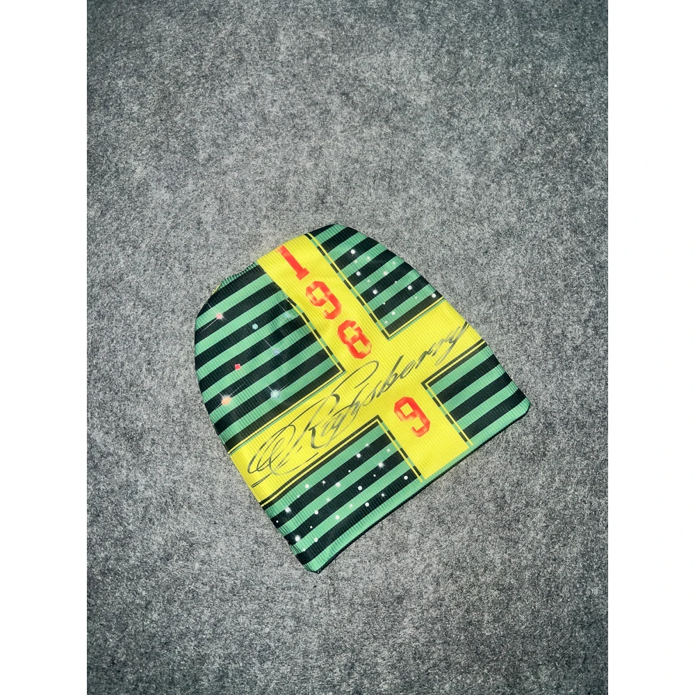 Hip-hop wind contrast striped knitted cold hat floral rhinestone printing decorative hooded men and women with the same.