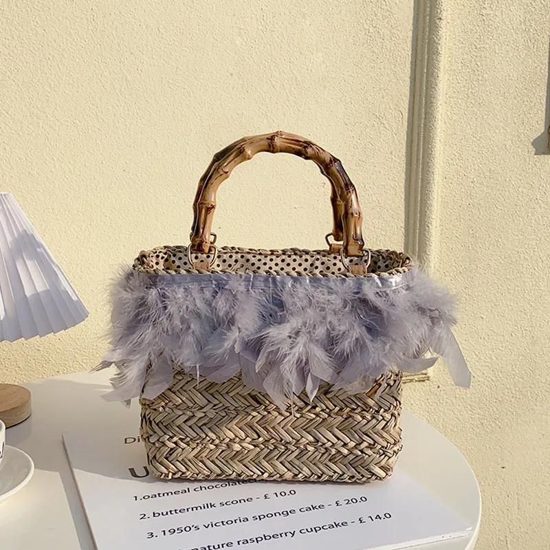 Borsa di paglia di piume bohémien borsa a mano di design con manico in bambù borsa a tracolla per donna 2023 borse da spiaggia in Rattan intrecciato