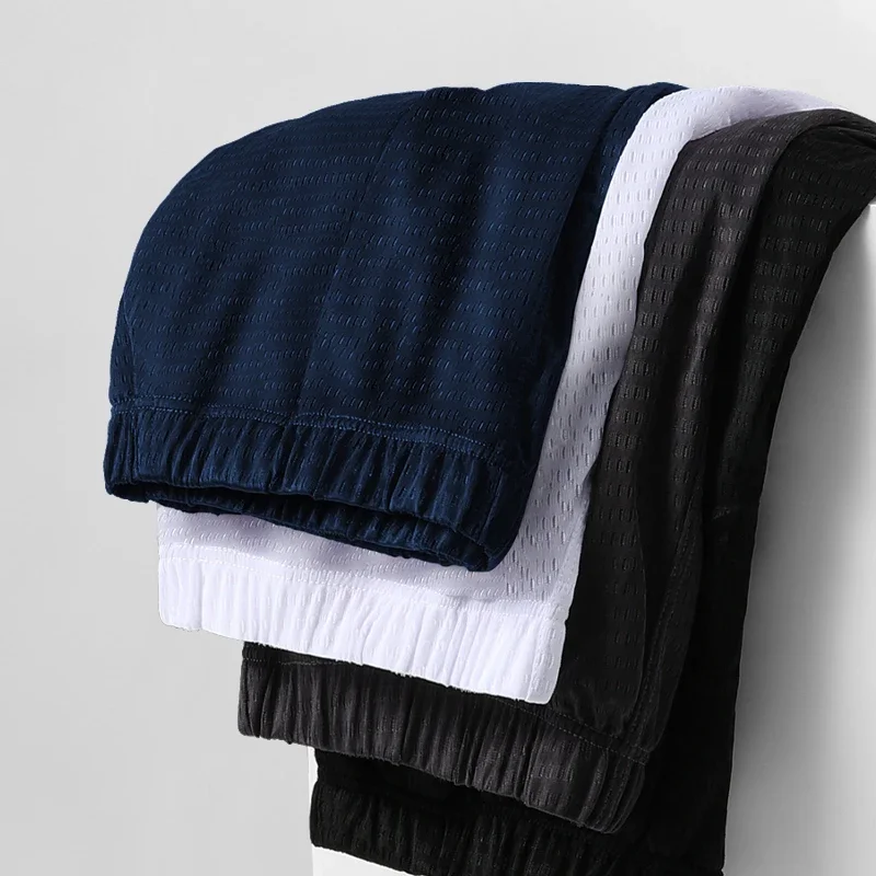 

5PCSThin capri pants, casual shorts, men's loose ice silk home pants, men's summer pajama pants as the base layer, and wear home