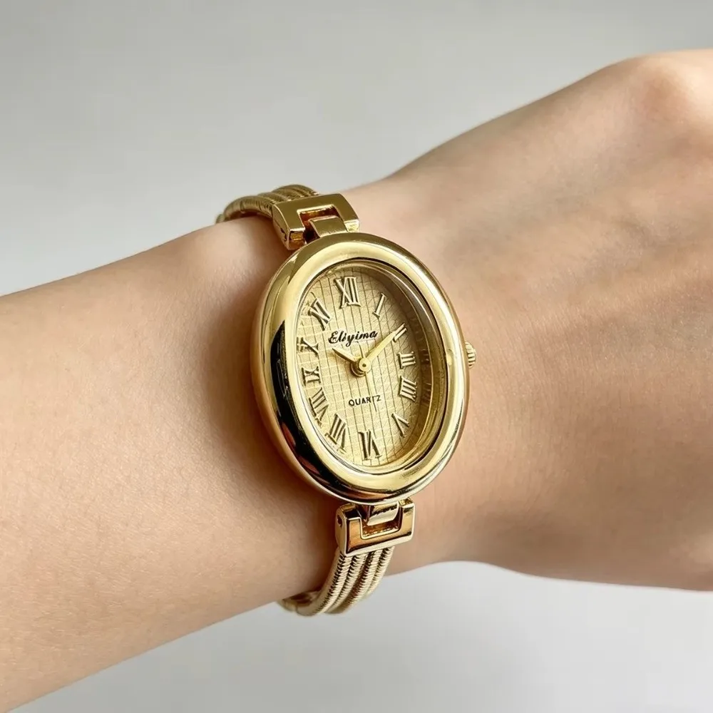Gold Plated Bracelet Watch Quartz Movement Roman Numerals Ladies Watch Oval Dial Antique Finish Quartz Wristwatch Commuting Wear