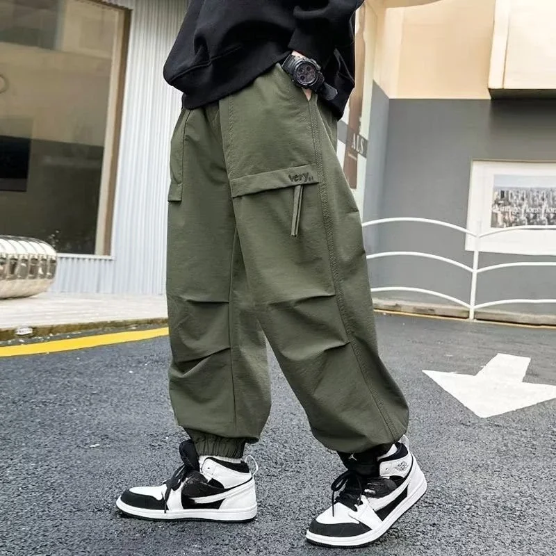 

Модная детская одежда, новинка 2025, осенние хлопковые брюки-карго для мальчиков, детские повседневные спортивные штаны, однотонные спортивные брюки