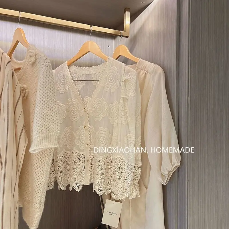 Blouse cotton lace hook flower three-quarter sleeve gentle wind cardigan top Korean version all-match loose knitted sweater