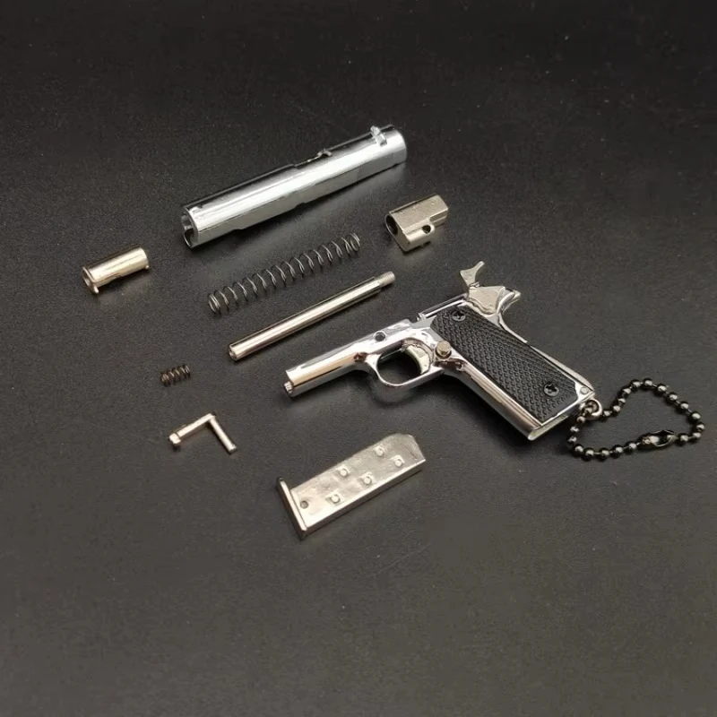 1:3 Schaalmodel van een 1911 volledig metalen pistool sleutelhanger met 7 afneembare kogels, decompressie speeltje, mannen cadeau