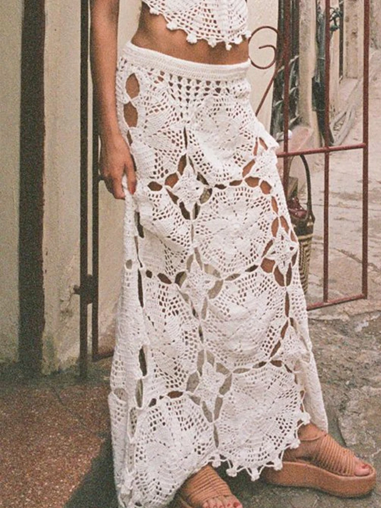 

Комплекты для отпуска в Гавайях: вязаные топы-халтеры без рукавов и юбки-миди в богемном стиле для лета