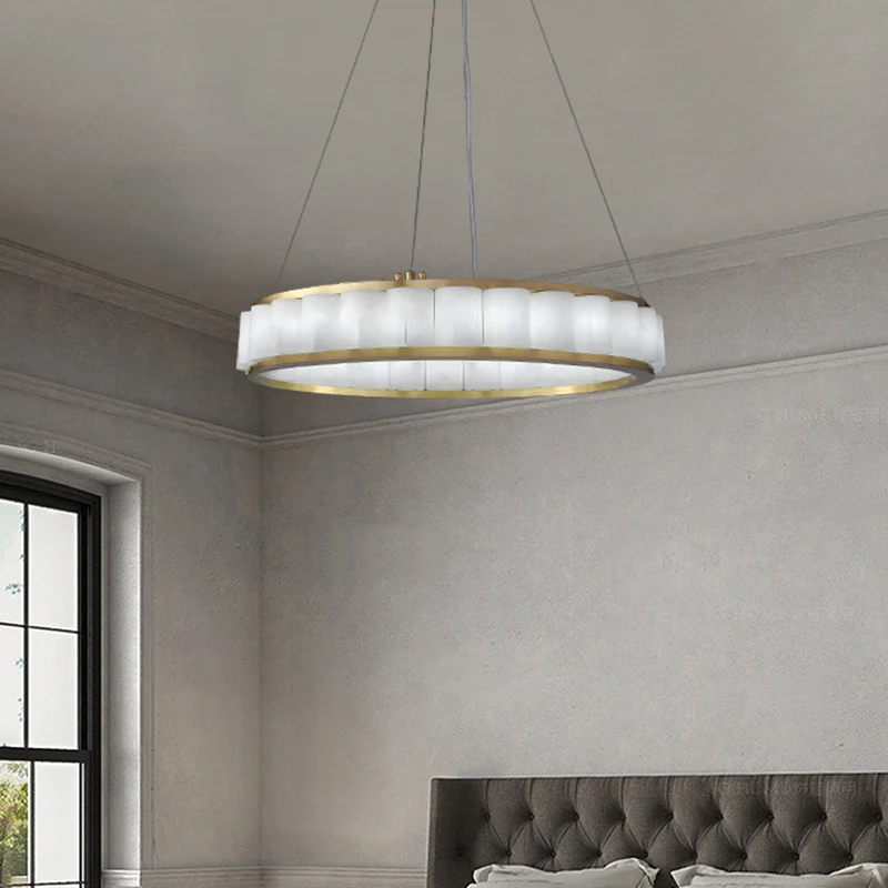 

A contemporary ceiling light defined by clean geometry, a dimmable function, polished brass or chrome finish Marble Chandelier