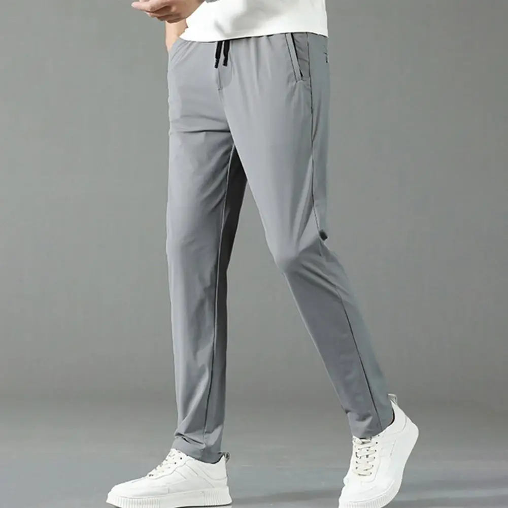 

Men Pants Quick Dry Ice Silk Pants Solid Color Drawstring Summer Thin Stretchy Men Trousers Loose Straight Running Joggers Pants