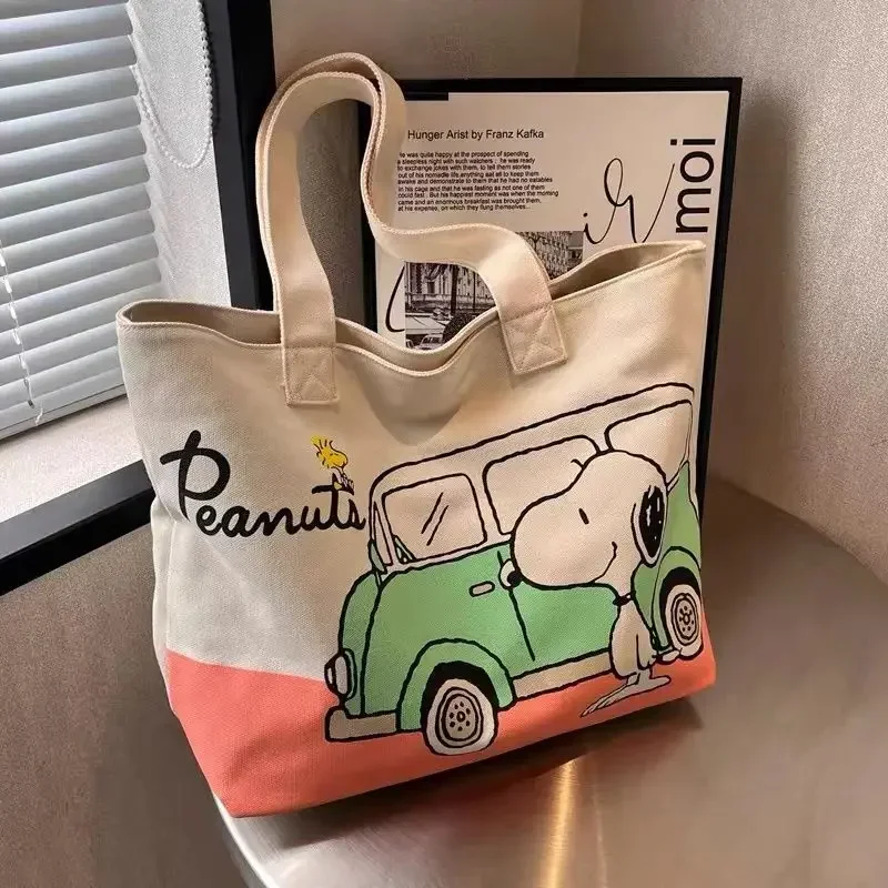 Snoopy Girl Neue niedliche Cartoon-Mode, vielseitig einsetzbar, lässig, für Reisen, leicht, große Kapazität, Aufbewahrung, tragbare Umhängetasche aus Segeltuch – Detail 3