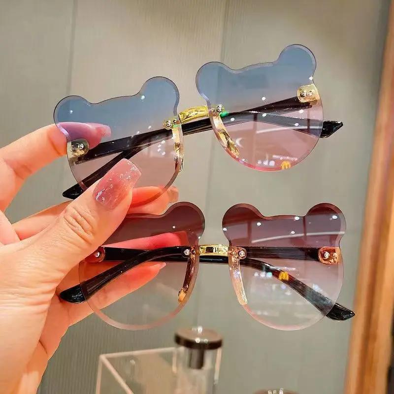

2025 New Simple Fashion Kids Rimless Sunglasses Trend Cartoon Sunglasses for Children Outdoor
