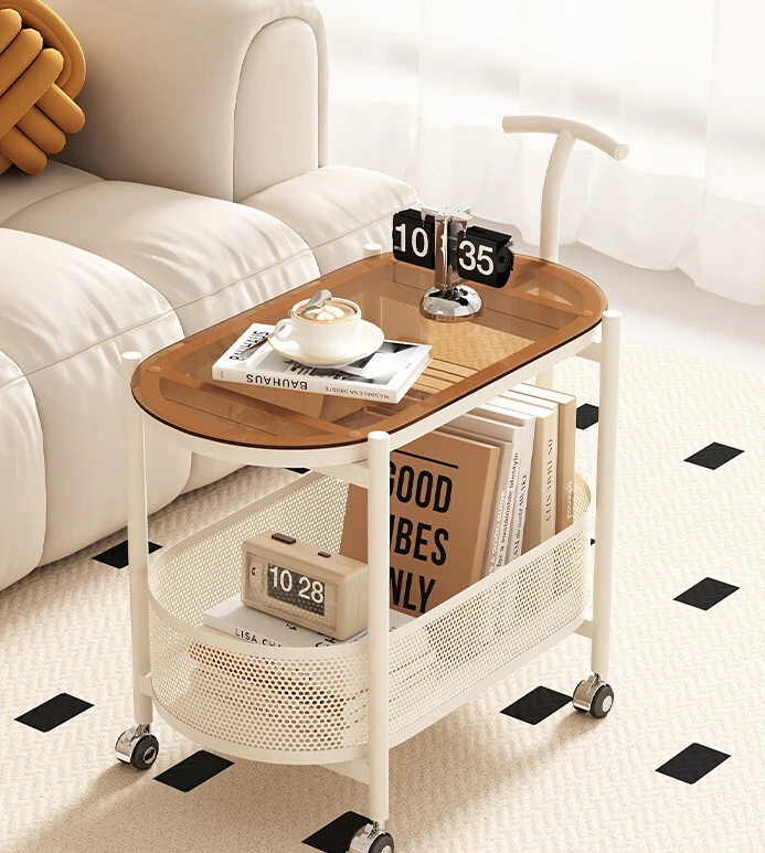 Snacks near the sofa in the living room can be stored in several layers of creative bookshelves with movable edges.