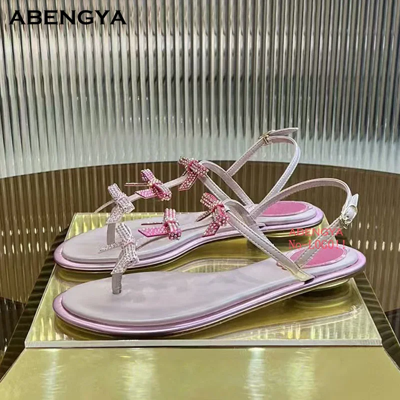 

2025 Designer New Leather Crystal Flat Sandals Women Open Toe Bow Knot Dress Shoes Summer Sexy Party Beach Sandals For Women