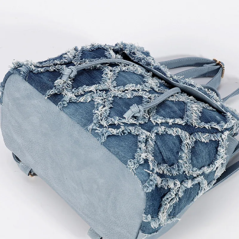 Hot selling denim backpack large capacity women\'s quilted diamond checkered flip backpack raw edge tassel denim bag