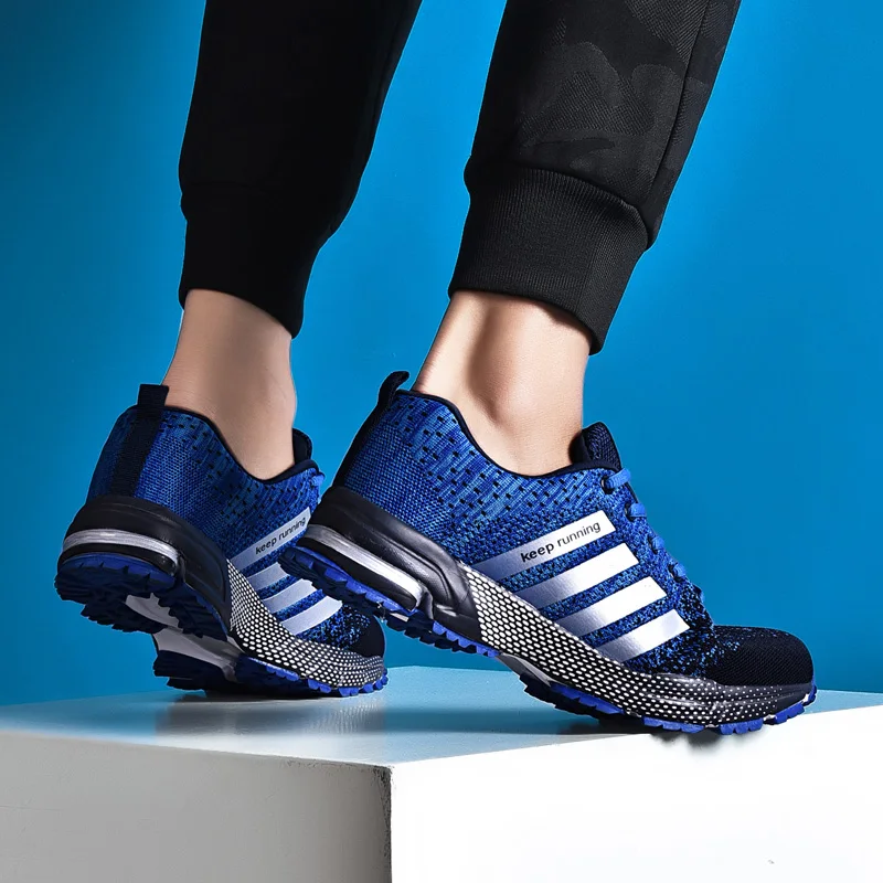 Mężczyźni kobiety buty do tenisa oddychające siatkowe sportowe buty lekkie Outdoor Jogging buty do chodzenia para sznurowane poduszki powietrzne