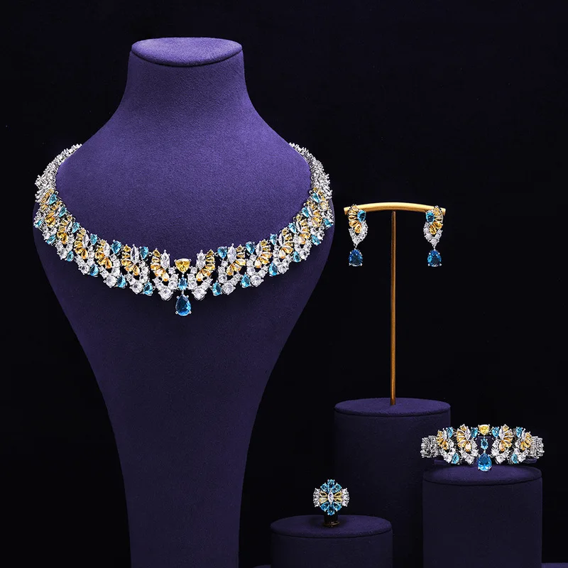 Copper electroplated gold luxurious and elegant light luxury water drop colored zircon set for banquets, gatherings, and parties