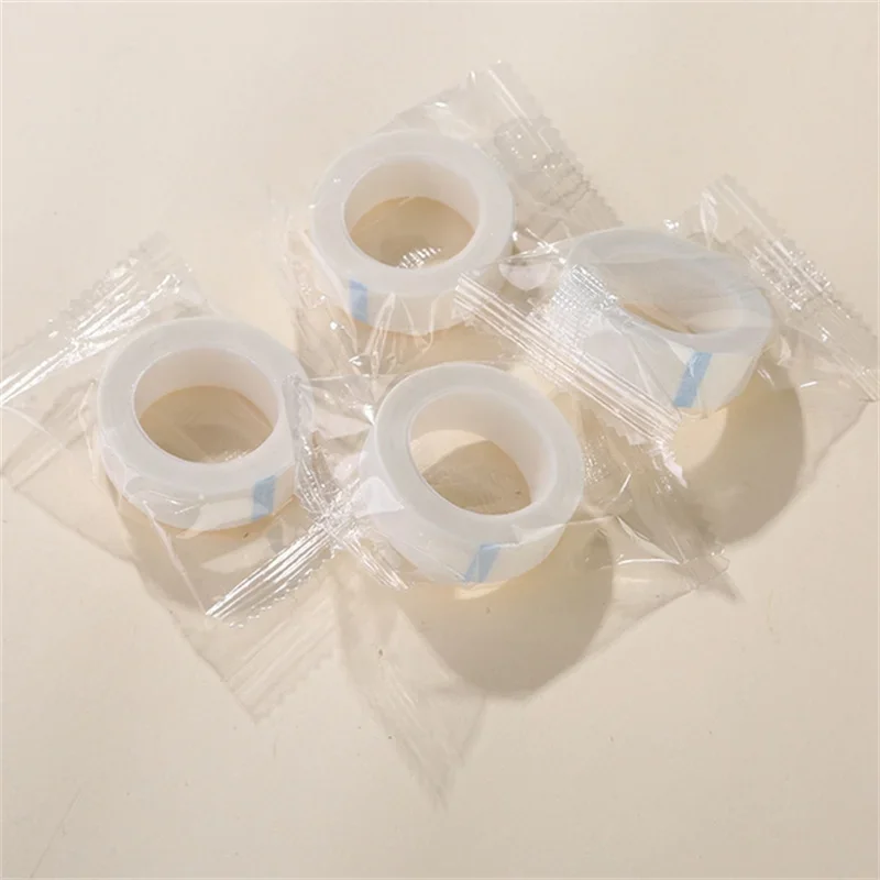 Cinta de papel para extensión de pestañas, cinta adhesiva de tela no tejida transpirable pelusa para parche de pestañas postizas, cinta de tatuaje