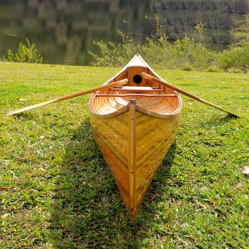 Handmade canoes, rib-bent bows 12 feet with paddles, used for lake fishing