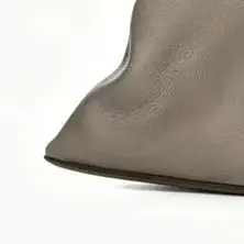 Botines de cuero fruncidos de media pantorrilla para mujer 2026 con punta puntiaguda, tacón de cuña curvo escultural único y diseño sin cordones a la moda