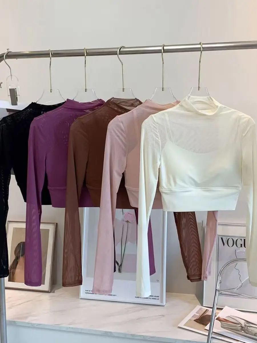 

Sexy High Value Net Long Sve Yoga Fitn Sports Running Top Women's Inteated Cup Pad Fitn Running Sportswear T-irt