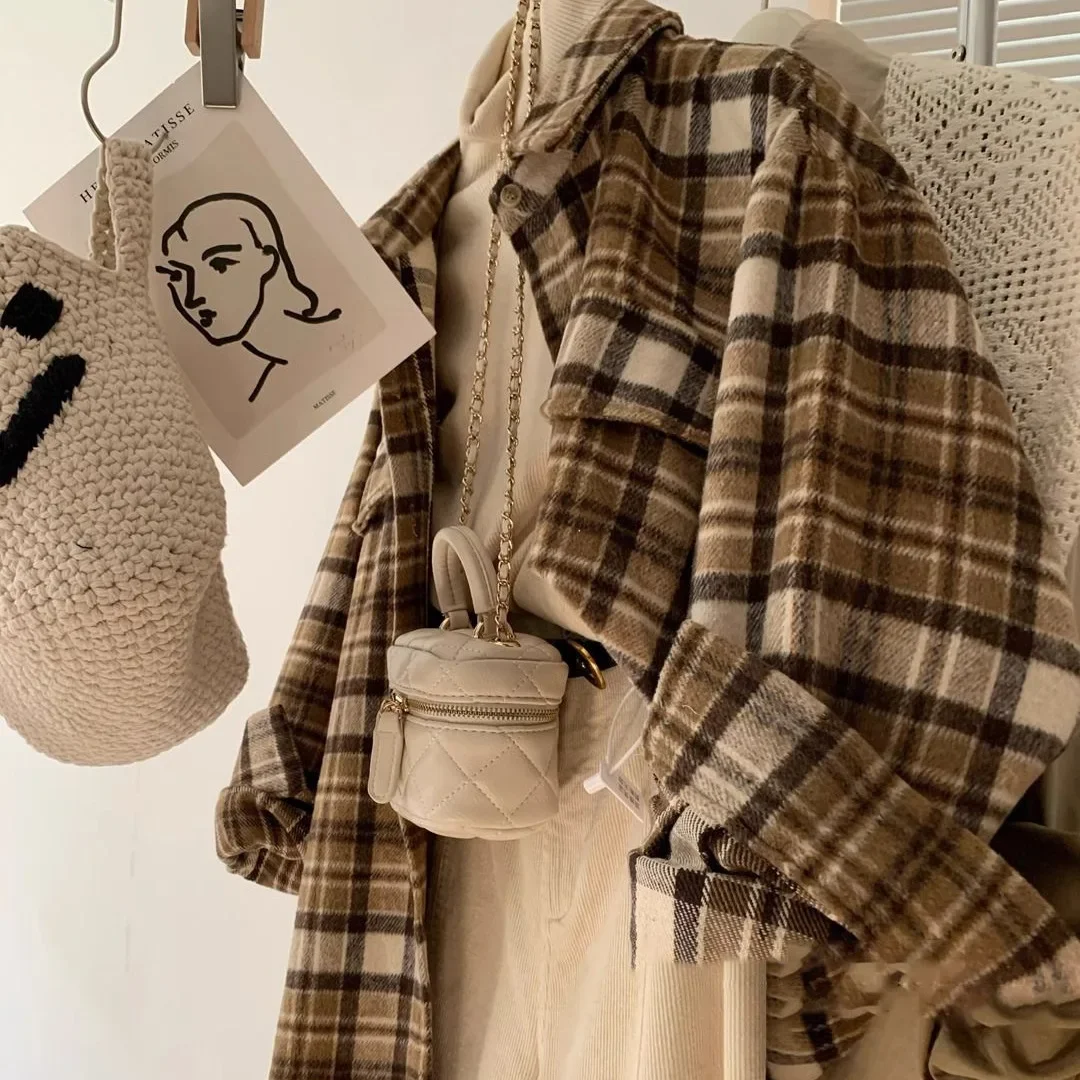 قميص صوفي منقوش داخلي منقوش عتيق للنساء مع طية صدر السترة لخريف وشتاء 2025 نمط جديد نمط شبكة حجب الألوان