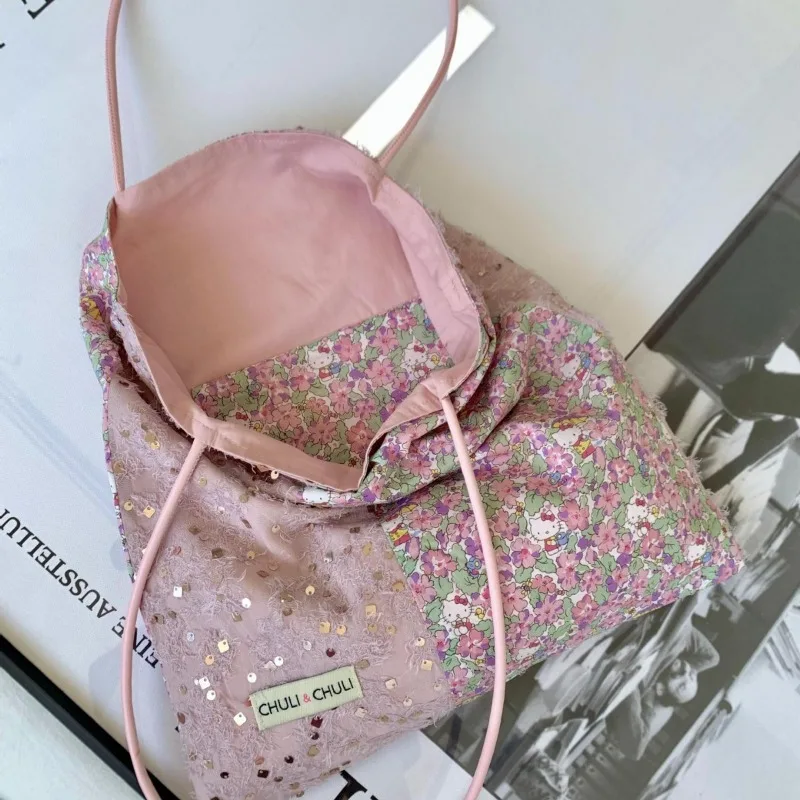 Bolso de lona Kawaii Sanrio Hello Kitty con diseño de nicho de lentejuelas rosa claro, bolso de lona de un solo hombro de alta gama, bolso de viaje para mujer