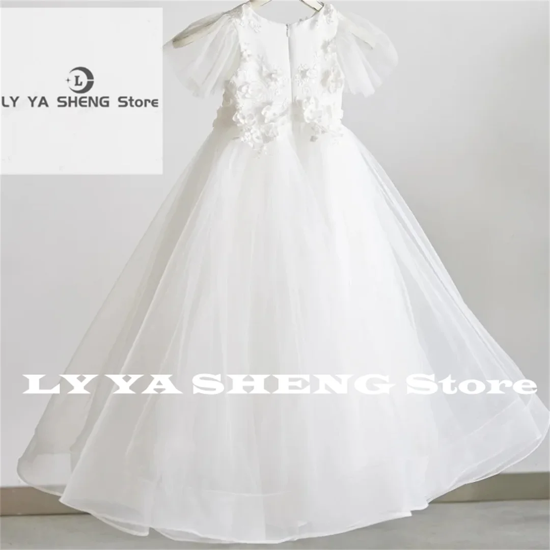 ชุดเดรสดอกไม้สีขาวTulle Flory Appliquesแขนสั้นสําหรับงานแต่งงานวันเกิดParty First Communion Gowns