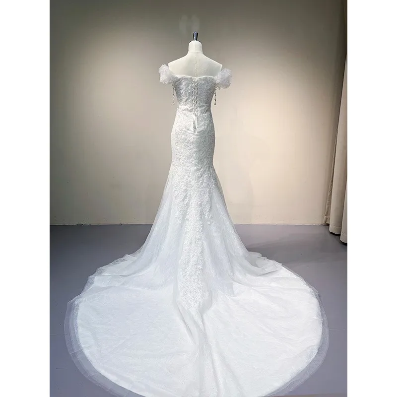 A new luxurious and heavy-duty fishtail chiffon dress with one-shoulder knot main fabric trailing lace