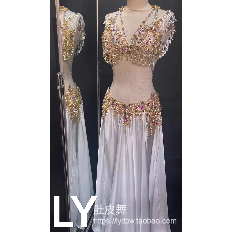 أزياء الرقص الشرقي المخصصة أداء الرقص الشرقي زي أبيض كبير تنورة المنافسة الذهب الصناعة الثقيلة الحرف اليدوية