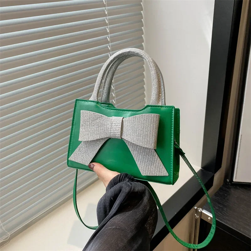 Bow fashion Korean version handbag contrasting color small bag women's  new texture niche shoulder messenger bag women