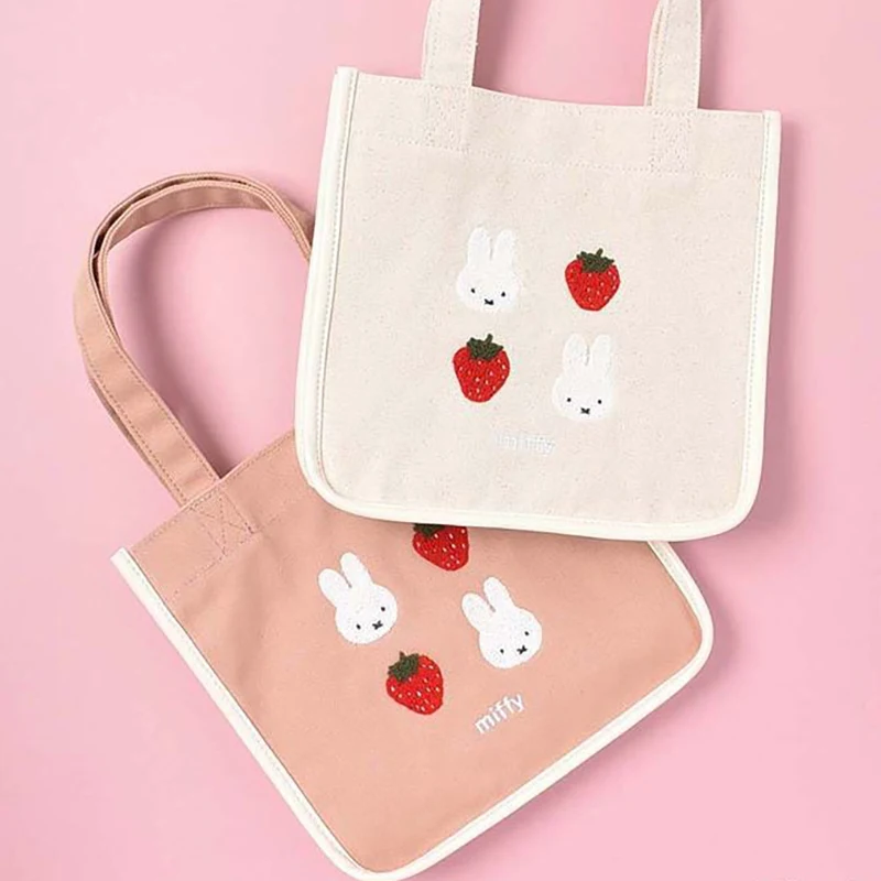 

Miffy Rabbit Canvas Bag New Kawaii Anime Strawberry Pink Girl Heart Canvas Handbag Cute Student Handbag Bento Bag Gifts for Kids