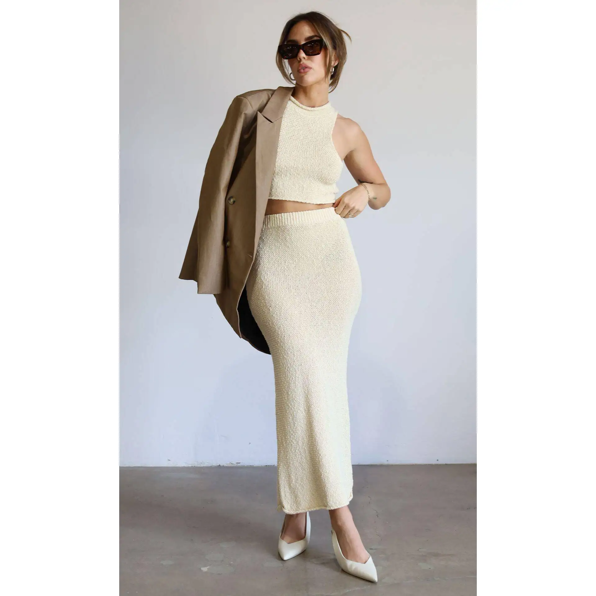 

Summer 2023 Knitted Short Sleeveless Vest Slim Fit Long Skirt Fashionable Elegant Set Women's Fashionable Sleeveless Knitted ...