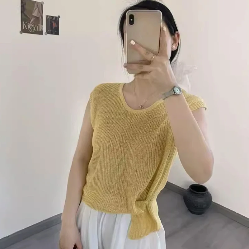 Modna damska kamizelka z dzianiny lodowej w koreańskim stylu, z okrągłym dekoltem i luźnym krojem, w kolorze niebieskim.