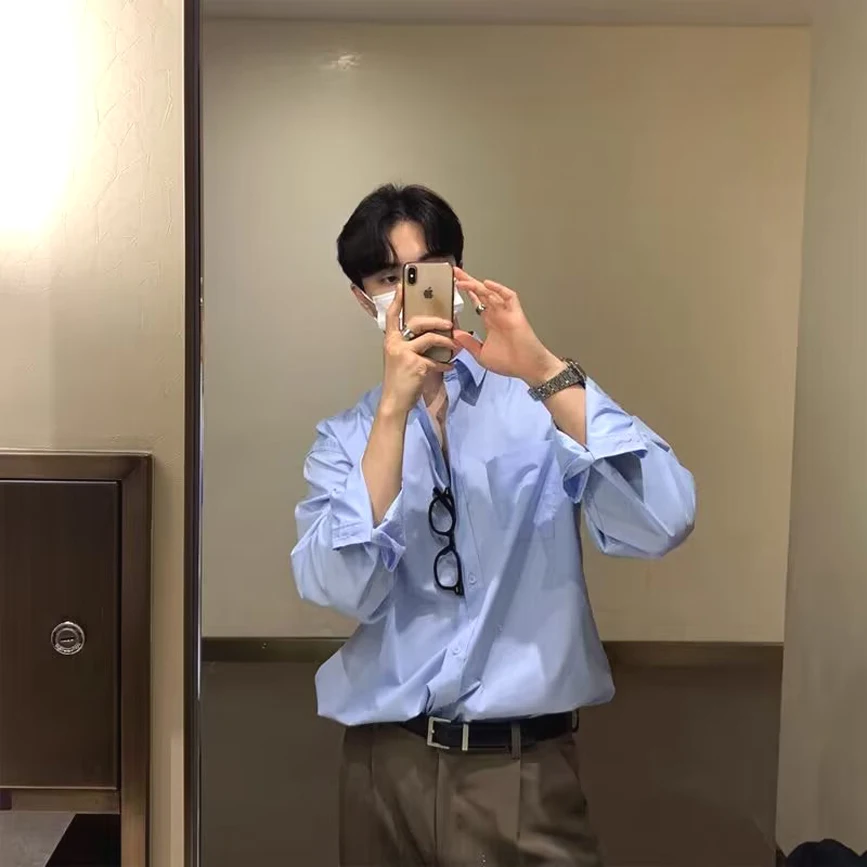 

Синяя мужская рубашка свободного кроя с длинным рукавом, модная, для многослойных образов, молодежная, однотонная, с острым воротником, на все сезоны