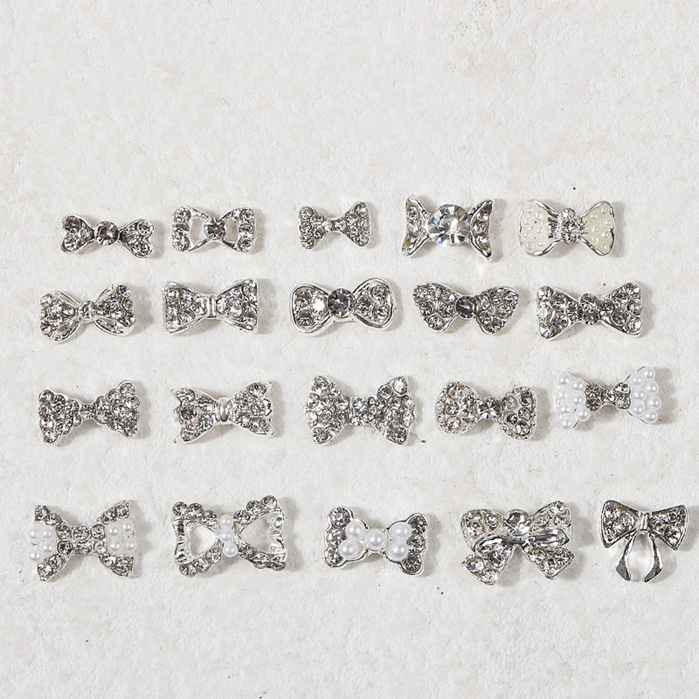 10szt Japońskie srebrne kokardki do paznokci Urok 3D Perłowa kokardka Kokardka Wstążka Aluminiowa dekoracja paznokci DIY Luksusowe akcesoria do paznokci